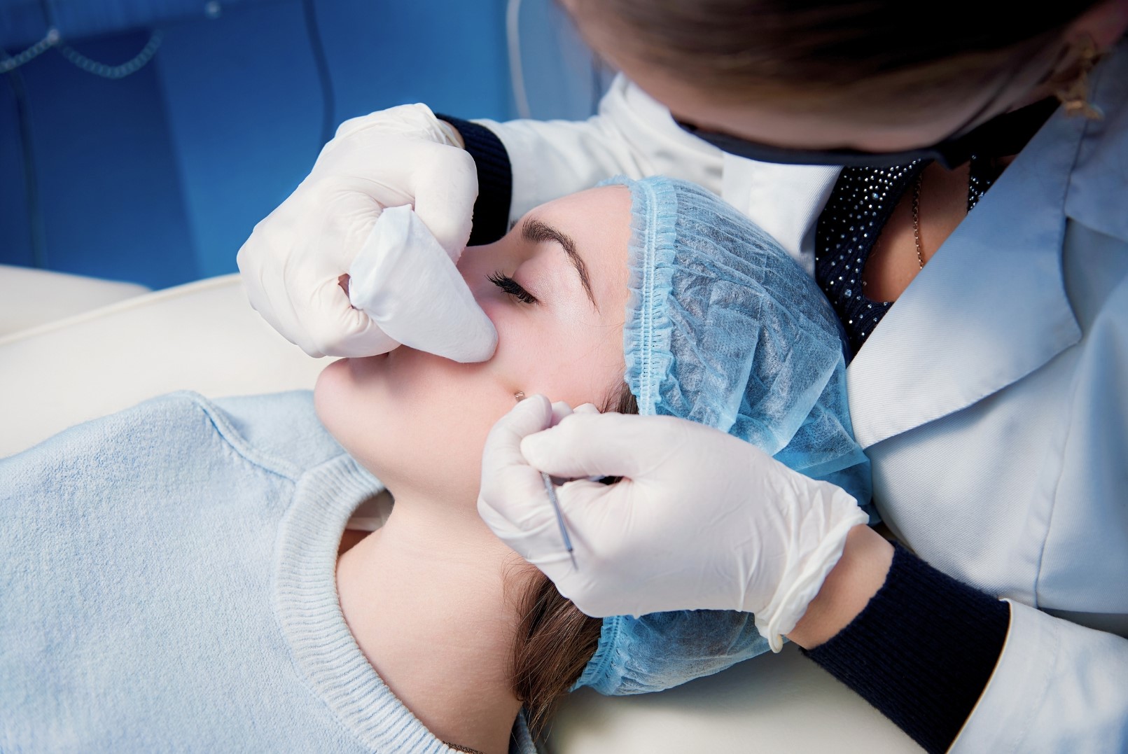 woman undergoing acne treatment