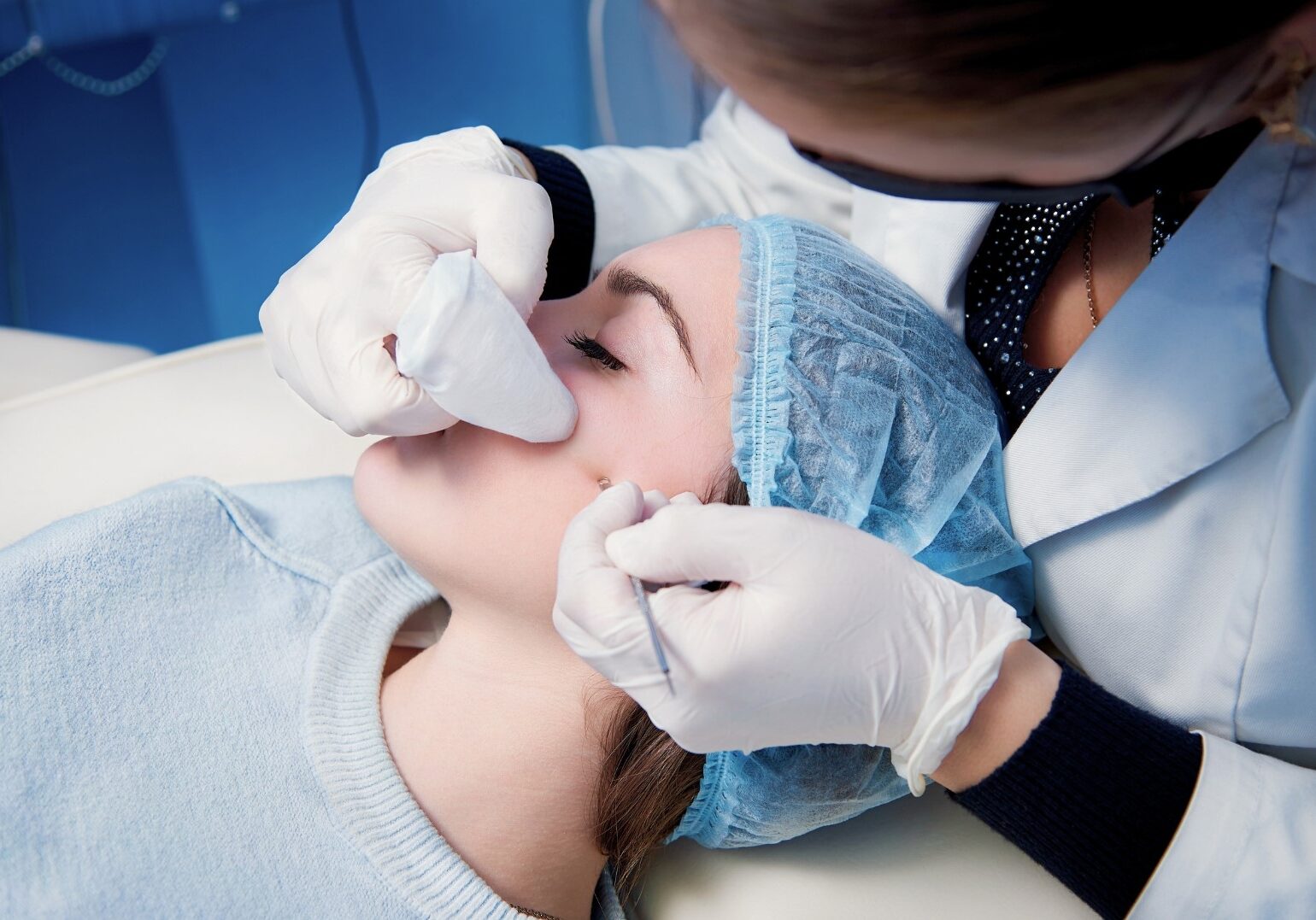 woman undergoing acne treatment