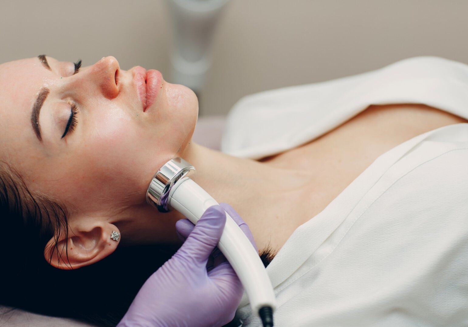 woman doing diamond lift treatment